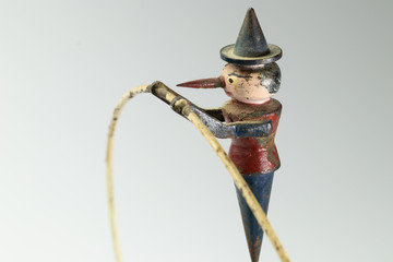 Vintage Pinocchio pendulum toy swing in balance - obrazy, fototapety, plakaty