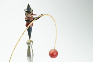 Vintage Pinocchio pendulum toy swing in balance - obrazy, fototapety, plakaty