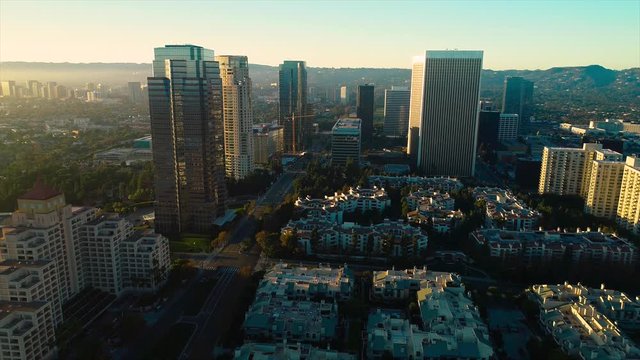 Studio City Los Angeles CA December 2018 sunset 5PM near skyline aerial view with Beverly Hills and the Santa Monica Mountains in background from helicopter drone plane