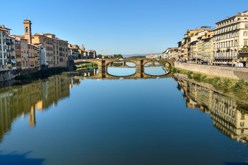 Obraz premium Trinity Bridge over river Arno at sunny day in Florence. Italy