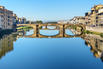 Obraz premium Trinity Bridge over river Arno at sunny day in Florence. Italy