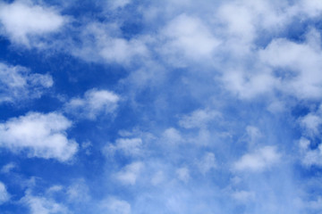 White clouds in the bright blue sky