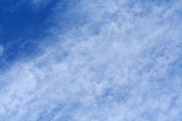 White clouds in the bright blue sky
