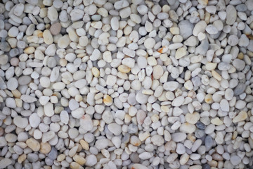 Top view small multicolor pebble, rock or gravel  seamless pattern for background