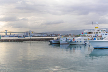Fototapeta premium Philippines Mactan Island Yacht marina on a cloudy day in a tranquil scene with reflections in water
