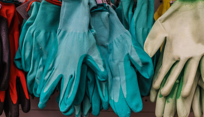 Multicolored rubber gloves from household chemicals store