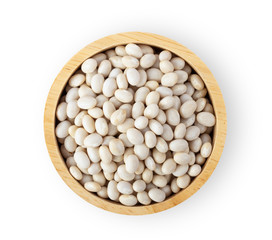 Heap of white beans in wood bowl isolated on white background