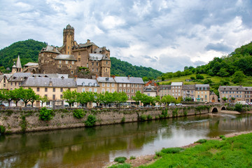 Fototapeta na wymiar French village and chateau along the river
