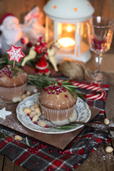 Christmas cake with rosemary and red topping. 