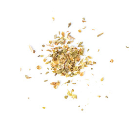 Pile of dried oregano leaves on a white background. top view