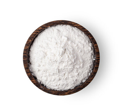 Pile Of Flour In Wood Bowl Isolated On White Background .top View