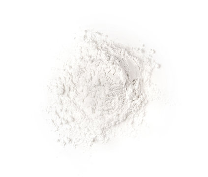Pile of flour isolated on white background .top view