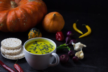 Pumpkin asian coconat cream soup. Autumn hot food