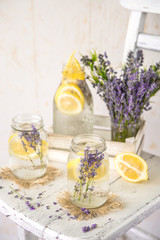 Obraz na płótnie Canvas Cold Infused Detox Water with Lemon and Lavender. Provence Style
