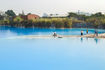 Fototapeta na wymiar Tuyet Tinh Coc lake , Natural color Crystal Blue lake at Trai Son mountain, Hai phong, Vietnam