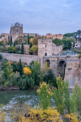 Fototapeta na wymiar The Puente de San Martn (St Martin's Bridge), a medieval bridge across the river Tagus in Toledo, Spain. Constructed in the late 14th century. 