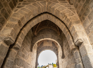 Fototapeta premium The Puente de San Martin (St Martin's Bridge), a medieval bridge across the river Tagus in Toledo, Spain. Constructed in the late 14th century. 