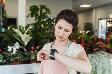 Florist looking what time it is