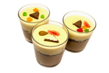 Chocolate dessert in glasses. Chocolate mousse or pudding in portion glasses with  close up. Desserts for business meeting conference concept