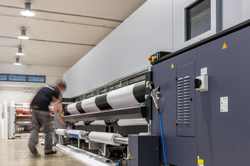 Big paper feed during Computer aided printing process, advanced technology in the press and...
