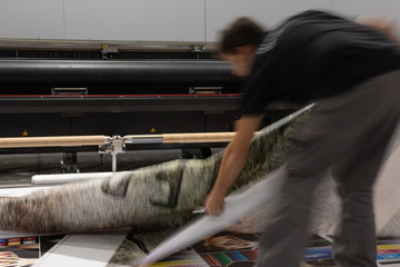 Professional  printing facility, big vinyl rolls, ready for large printer supply. Glossy, matte, ecological materials, mostly used for commercial billboards, urban advertising, and oversized projects.