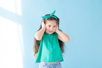 Portrait of a beautiful young girl sleep silence green clothing