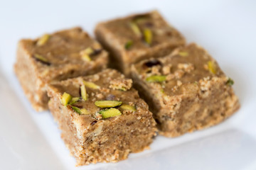 Adadiya (sweetened black gram flour fudges made with cardamom, ginger, nutmeg,almonds and saffron ) – Indian Sweet made in the winters