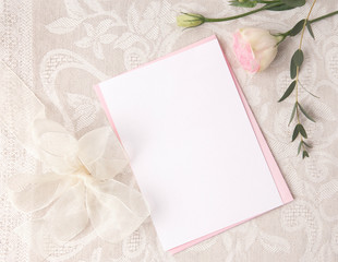 Wedding invitation mockup with blush flowers