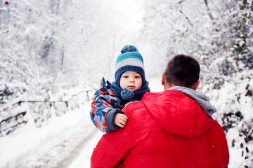 Father holding his son,portrait of little kid