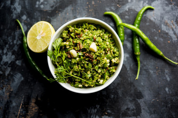 Hot and spicy green chilli chutney using hari mirch, cumin seeds, lemon juice and coriander. served...