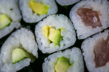 Sushi and Sashimi rolls. Fresh made Sushi set with salmon, prawns, wasabi and ginger. Traditional Japanese cuisine