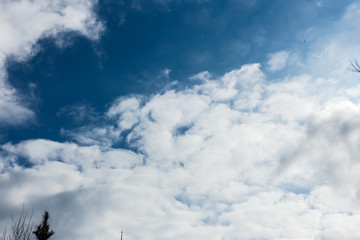 dense blue clouds in twiling sky in winter