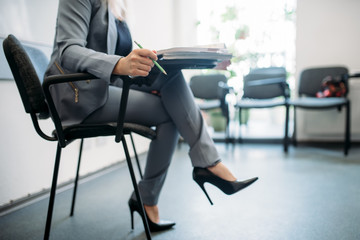 Woman passes interview in office, head hunting