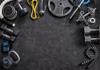 Sports equipment on a black background. Top view. Motivation