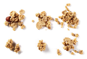 Set crunchy granola, muesli pile with nuts isolated on white background, top view