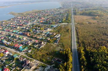 Aerial view onto rural street in autumn. Russia