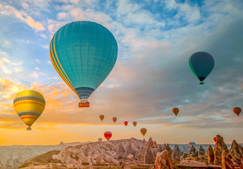 Hot air balloon flying over spectacular Cappadocia
