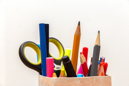 children's set for creativity: scissors felt-tip pens pencils in a stand