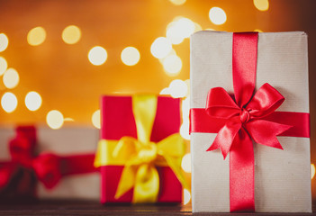 Present box and Fairy Lights on background