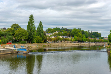 Banks of the Mayenne river, City of Laval, Mayenne, Pays de Loire, France. August 5, 2018