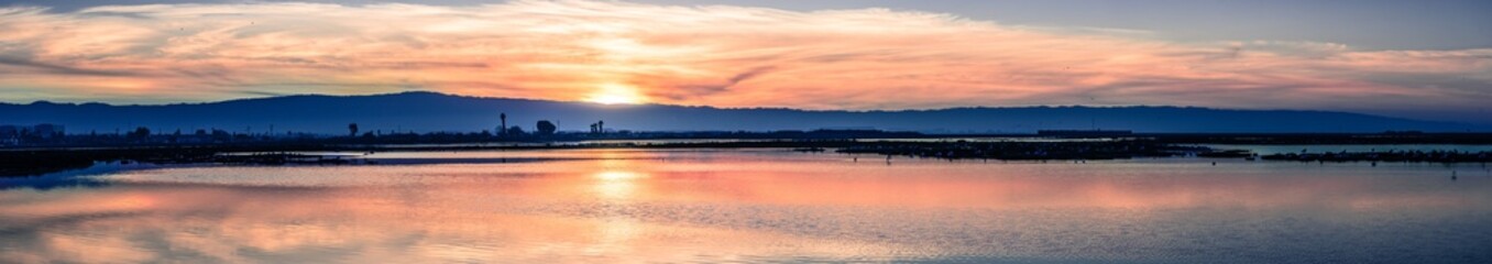 Obraz premium Sunset views of the tidal marshes of Alviso, Don Edwards San Francisco Bay National Wildlife Refuge, San Jose, California