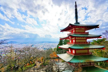 Rucksack View of the Japanese temple in autumn with Mount Fuji in the background in Japan. © Javen