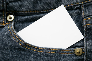 blank white paper or card in front pocket of dark blue jeans with copyspace for sale text or business concept - 239070930