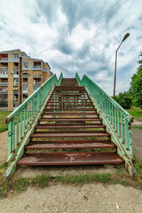 Novi Sad, Serbia May 26, 2018: Railway line in Detelinara settlement in Novi Sad. An old overpass across the railway line.