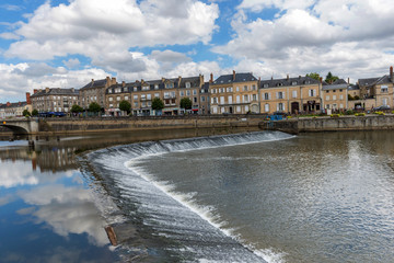 Fototapeta premium Banks of the Mayenne river, City of Laval, Mayenne, Pays de Loire, France. August 5, 2018