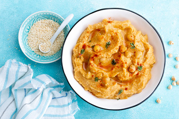 Hummus with chickpea and tahini, delicious and healthy protein vegan and vegetarian food, top view, flat lay.