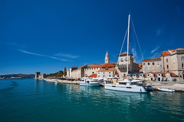 Fototapeta na wymiar Sailboats and yachts in the port of Trogir in Croatia.