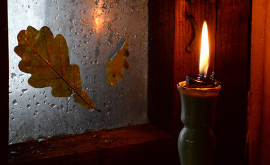 autumn still life with candle