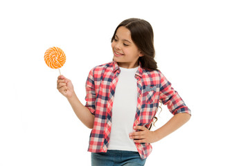 Girl smiling face hold sweet lollipop. Girl like lollipop candy isolated white background. Control nutrition of your child. Sweet tooth and food addiction. Can sugar make us happy. Sweet happiness