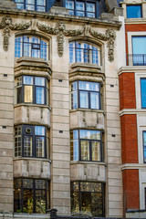 Fototapeta na wymiar Large roman windows of apartment in london